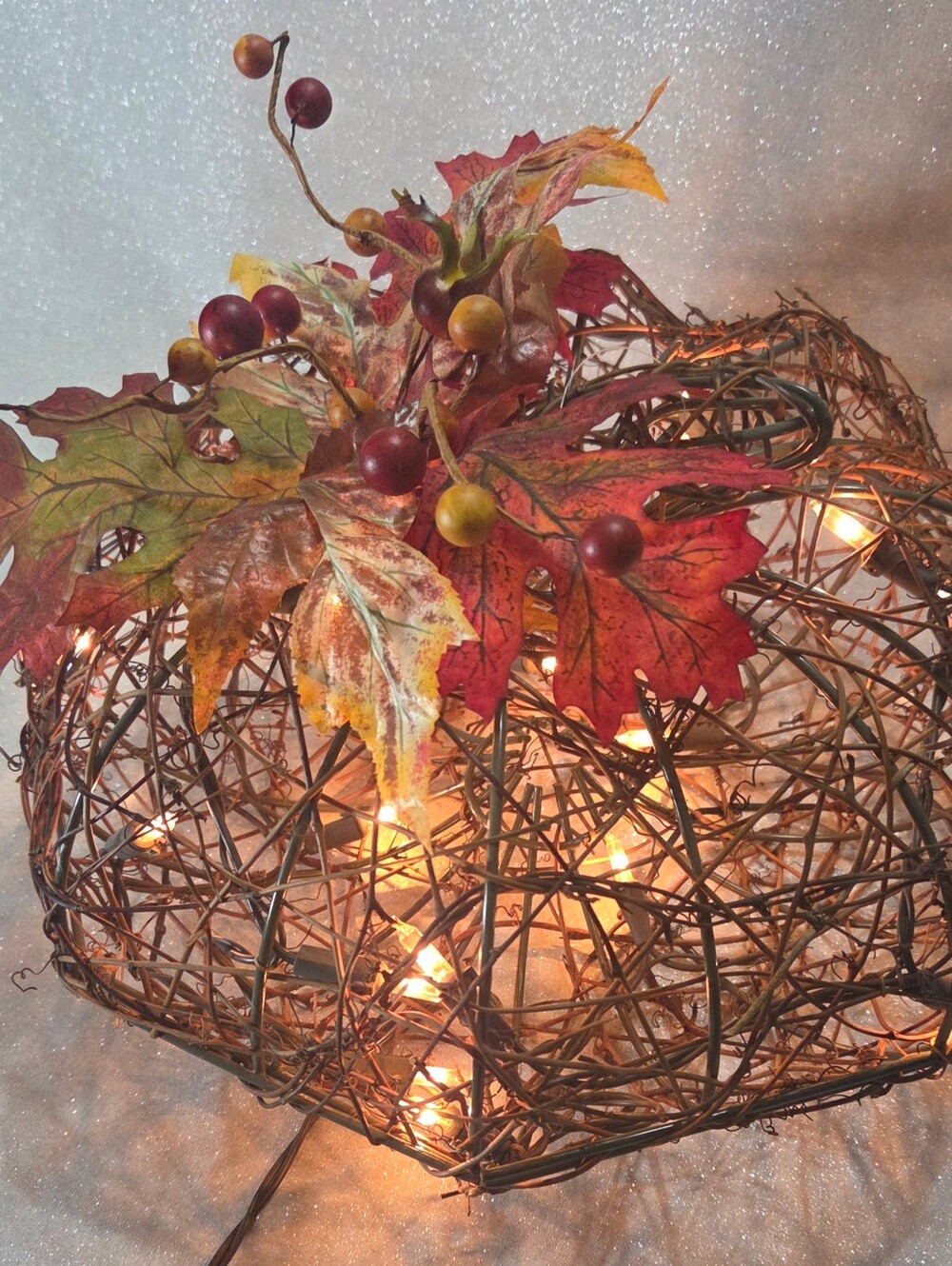 Lit Autumn Vine Pumpkin with Red and Gold Leaf Accents